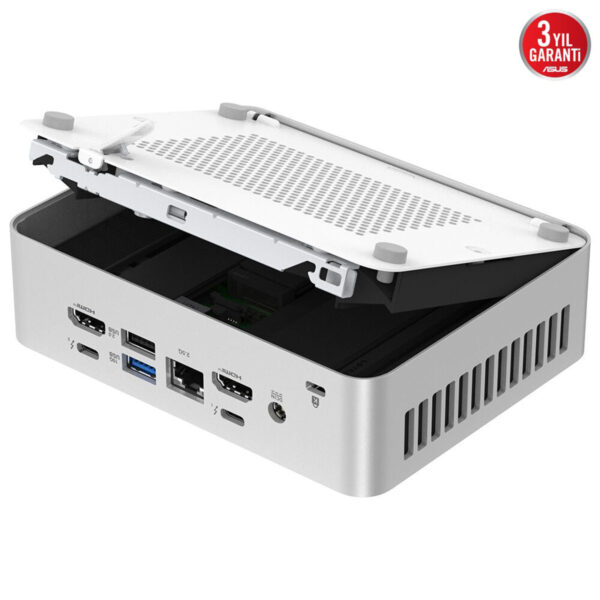 Dahilı soğutmalı mini bilgisayar, iç kısımları görünür halde, çeşitli bağlantı portları ve USB girişleriyle yüksek performans sağlar.