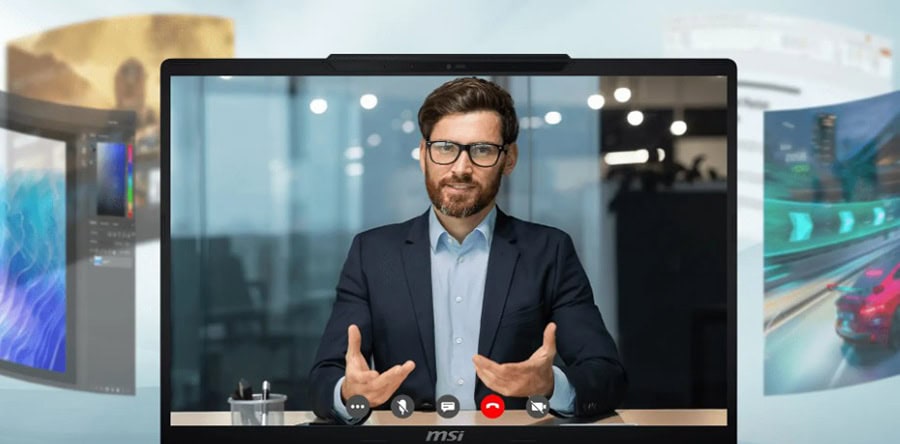 Ofis ortamında bilgisayar ekranında video konferans yapan adam, iş toplantısı gerçekleştiriyor.